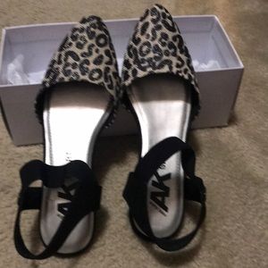 Anne Klein Sport Animal Print Sandal. Black